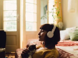 Girl spending the weekend at home listening to music